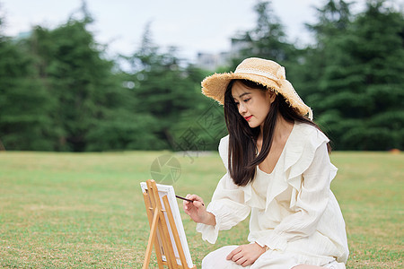 文艺美女户外油画写生图片