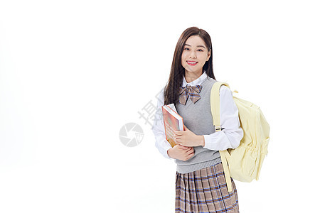 抱着书本的女学生形象图片