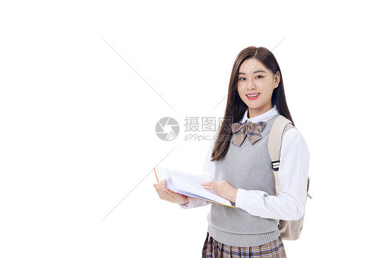 抱着书本的青年女学生图片