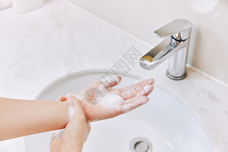 女性洗手消毒手部特写背景