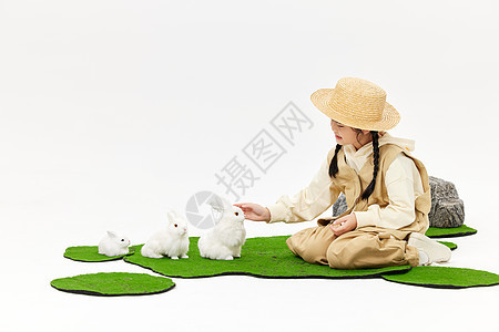 小女孩与小兔子互动图片