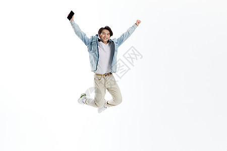 活力跳跃的青年男性背景图片