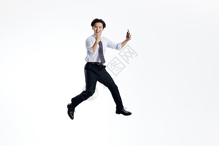 跳跃加油的商务男性背景图片