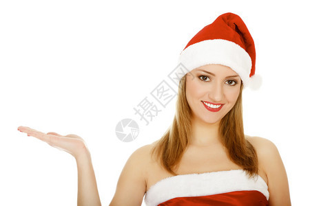 穿着红色圣诞帽子的漂亮女孩手掌举起来图片