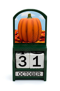 木制日历日期为10月31日和南瓜图片