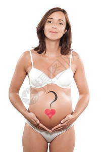 怀着心脏的天主教孕妇在腹部与世隔图片