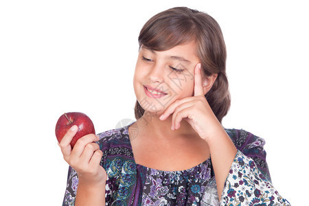 可爱的年轻前女孩一个苹果思考的女孩孤图片