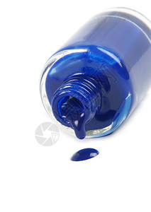 在白色的蓝色指甲油瓶图片