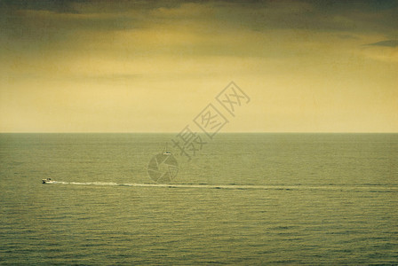 海上日落帆船海景图片