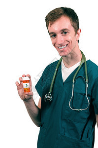 英俊的年轻男医生拿着处方药丸瓶图片