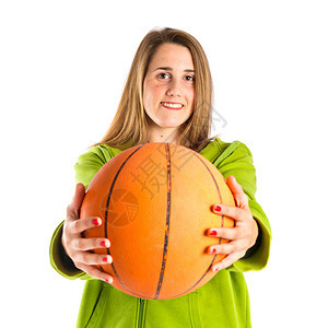 篮球在白色背景的年轻女孩图片