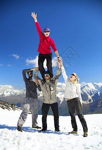 雪山顶的球队运动和图片