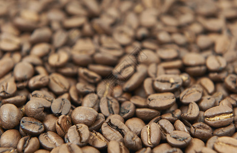 轻烤咖啡豆的特写图像背景图片