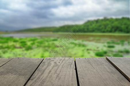 为背景使用而对梯田木和湖边风景视图进行突出重点图片