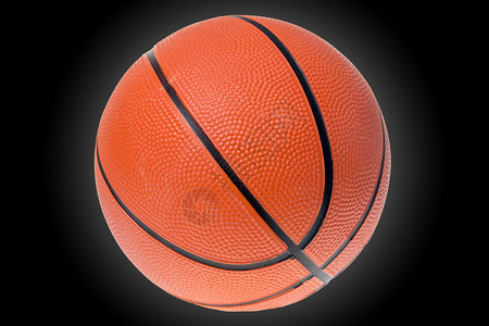 孤立在黑色背景上的篮球背景图片