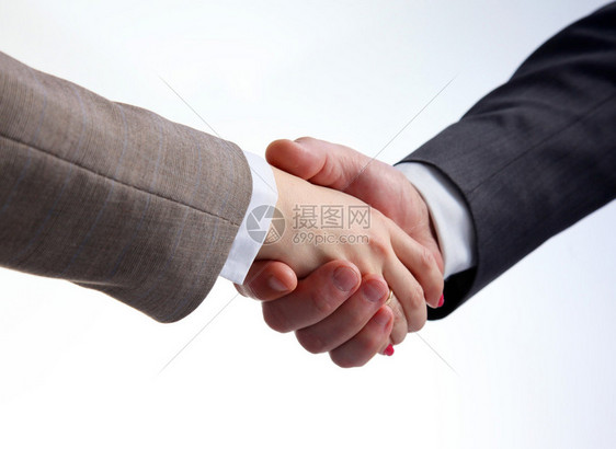 谈判桌握手缔结合同的商务会商图片