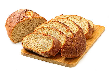 白色背景上的新鲜切片面包图片