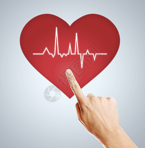 男人按压心脏和心电图心跳的象征图片