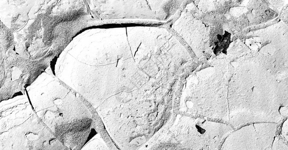 古老沙漠和抽象破碎的沙质在奥曼按摩a图片