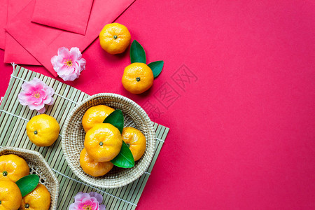 新年节庆装饰品橙兰果叶子木篮红包图片