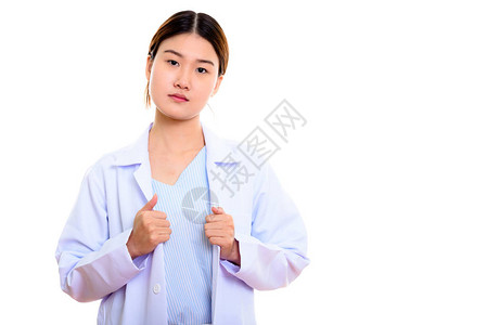 电影演播室拍摄年轻美丽的亚洲女医生用双手拿图片