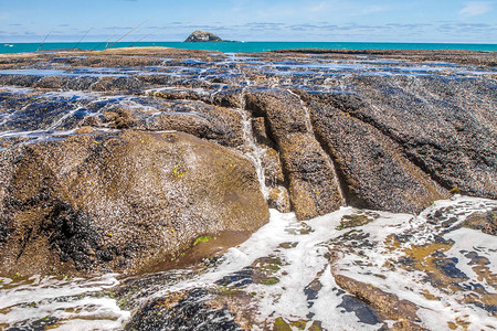 穆里瓦伊海滩新西兰水流喷洒图片