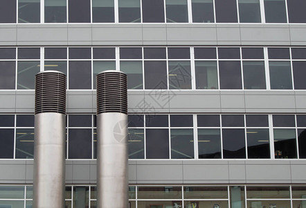 办公室大楼玻璃窗外烟囱财务背景办图片
