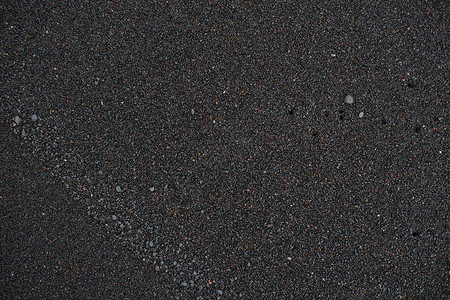 黑沙滩的宏观摄影今晚暗影在黑沙图片