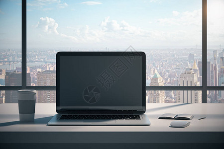 现代设计师办公室桌面与空笔记本电脑屏幕咖啡杯一些用品和全景城市景观与日光模拟3D渲染图片