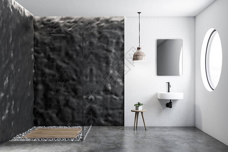 白色瓷砖和粗糙的灰色墙壁浴室内部配有白色水槽垂直和玻璃墙淋浴图片