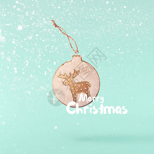 圣诞节的概念在绿松石背景下坠入空中圣诞复古装饰的创意圣诞构想图片
