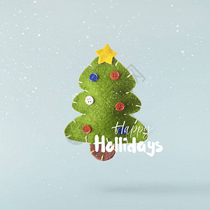 圣诞节的概念创意圣诞构想由落入蓝色背景的空气绿色圣诞可爱树中图片