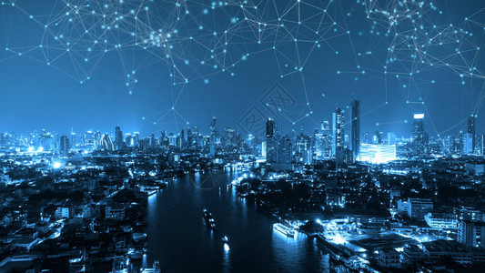 卫星与泰国曼谷市中心潮法拉河的数字网络连接线智能科技城市金融区和商业中心夜间摩天大楼和建筑物背景图片