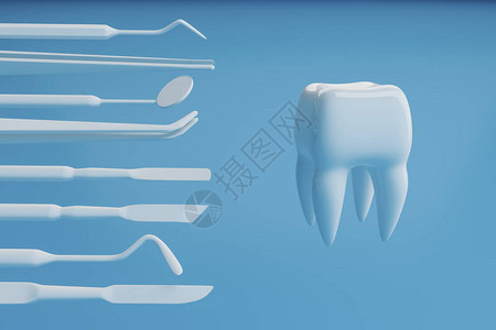 带有牙医工具的蓝色背景上的牙齿图像图片