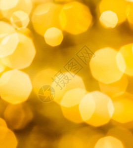 金色圣诞灯饰新年前夜烟花和抽象质感概念图片
