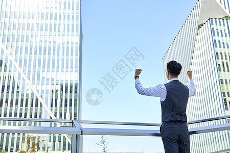 商务男背影商务男士加油努力手势背影背景