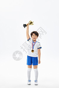 踢足球的小男孩获奖图片