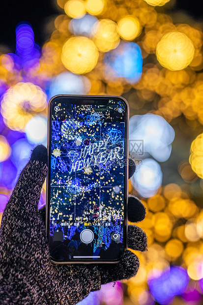 手机拍摄的新年快乐背景图片