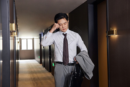 高清图片商务男士疲惫出差高清图片商务男性职场疲惫烦恼高清图片劳累