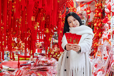 采购年货新年装饰的女性形象图片