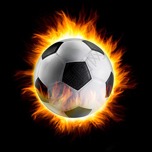 黑色背景上着火的足球图片