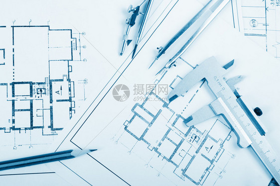 建筑项目蓝图蓝图卷和分隔罗盘卡尺计划中的折叠尺工程具从顶部查看复制空图片