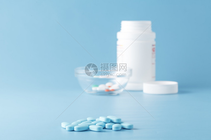 药房题材蓝色和白色药片抗生素药片图片