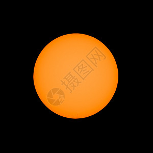 用带有太阳滤光片的望远镜从上看到的太阳背景图片