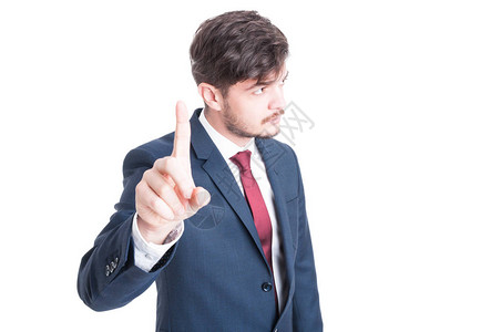 商业男子站着做等待手势图片