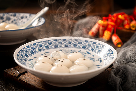 新年美食黑芝麻汤圆背景图片