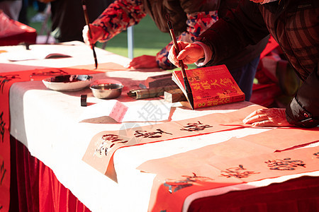 武汉新年年货节写对联背景图片