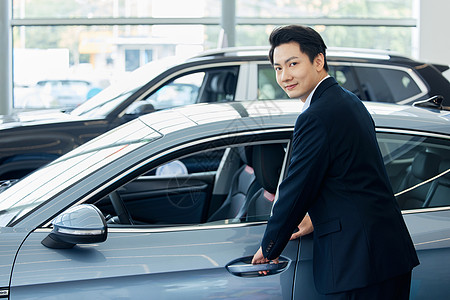 男性汽车销售员形象背景图片