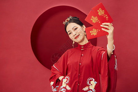 传统服装女性手拿红包图片