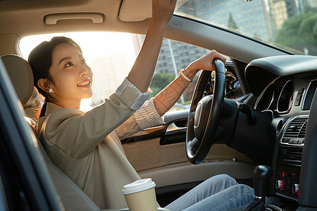 美女,车开车的漂亮年轻女子背景